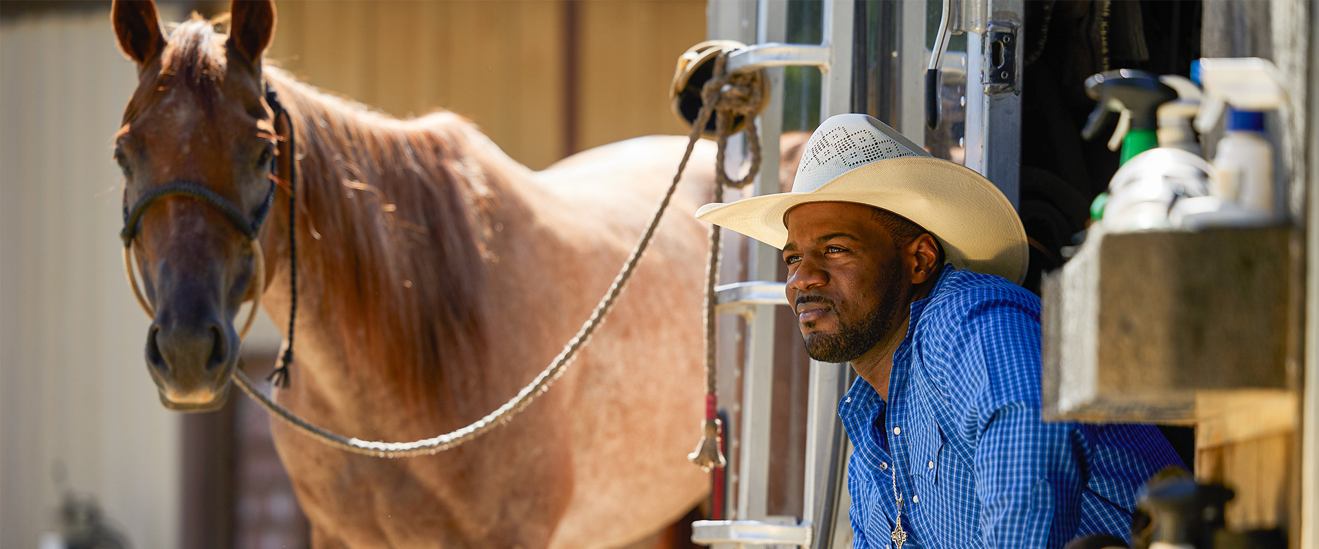 Stephan Robinson sitting near horse 